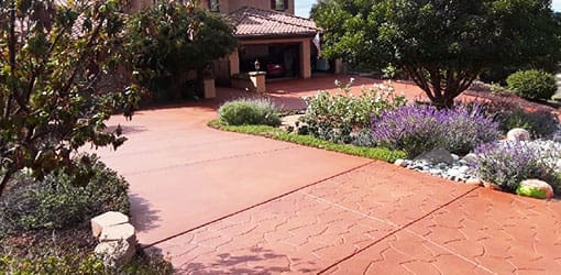 alt="a-completed-concrete-driveway-instllation-and staining.