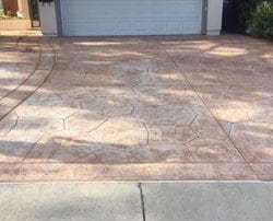 alt="before picture acid wash restoration, concrete driveway paint removal project"