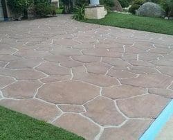 alt="stamped concrete driveway installation San Diego California"