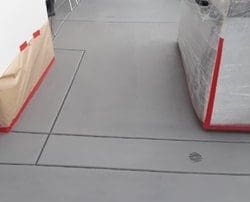 alt="concrete-restoration-front -of-the -house-walkway concrete-staining-and sealing."