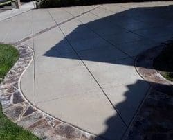 alt="driveway slab and flagstone coping installation project in Rancho Santa Fe"