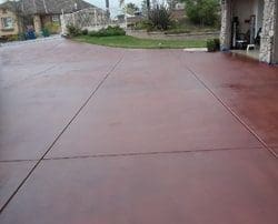 alt="very-large-driveway -concrete-slab Installation-finish-with-staining-and-sealing-Rancho-Santa-Fe-California.