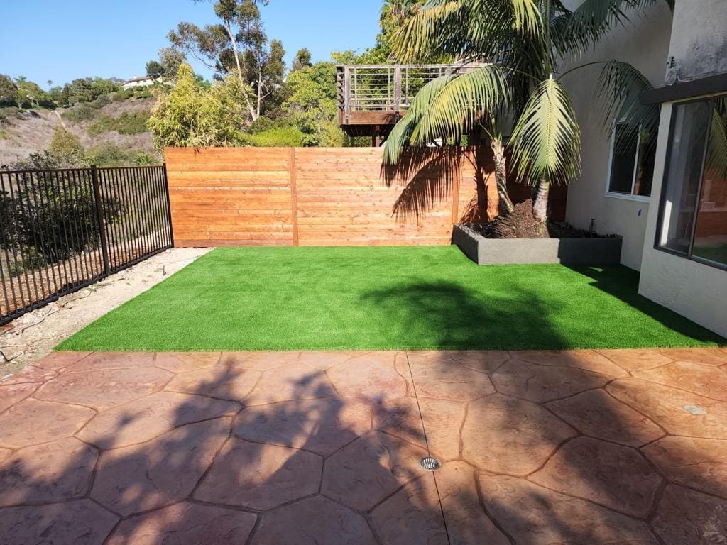 alt='backyard concrete patio restoration '