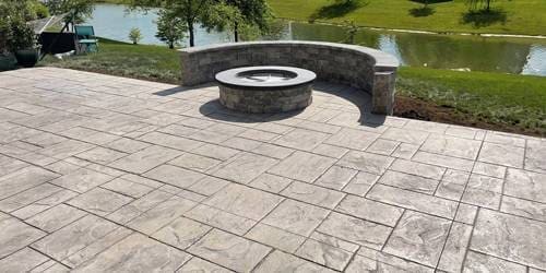 Stained Stamped concrete patio and fire pit