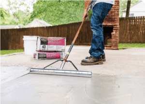 alt="backyard-patio-concrete-overlay."